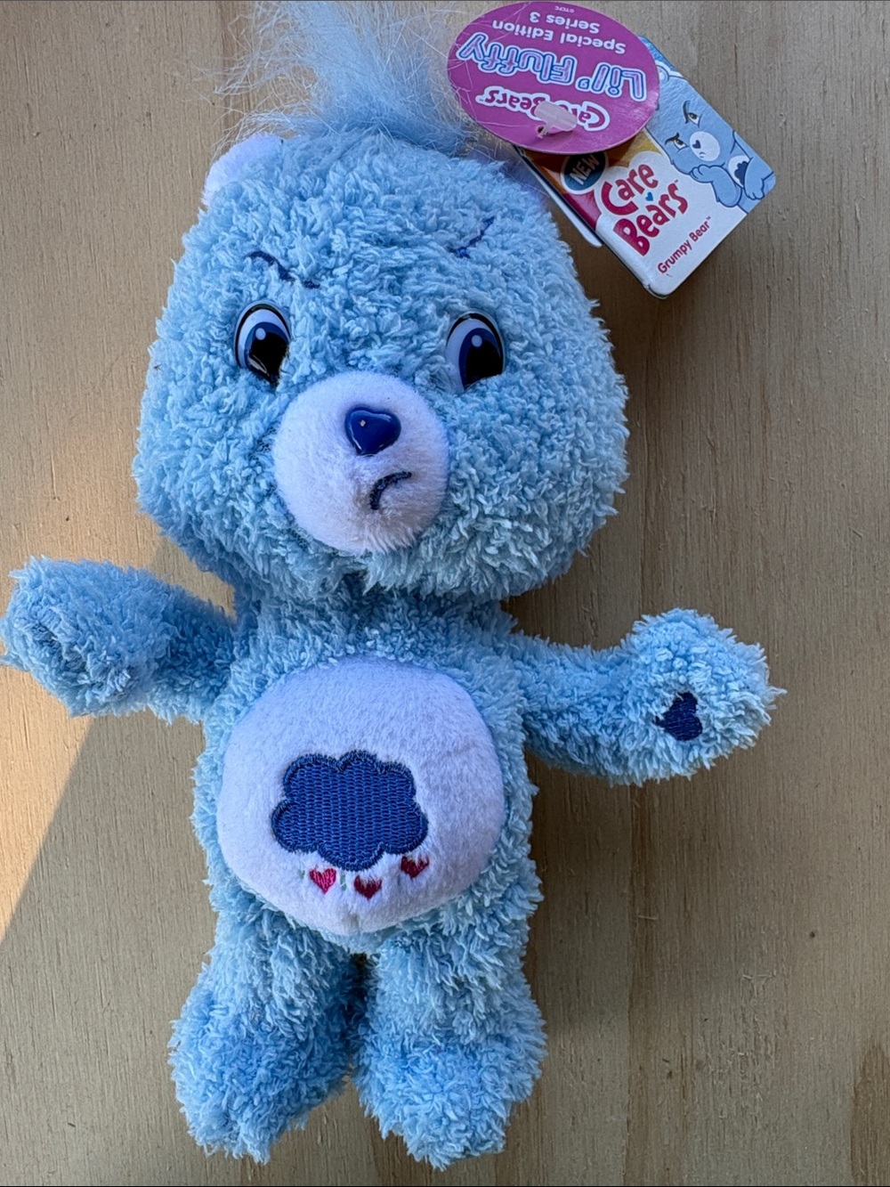 Care Bears Light Blue Grumpy Bear Plush with Cloud Belly Badge